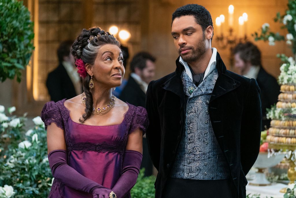 BRIDGERTON (L to R) ADJOA ANDOH as LADY DANBURY and REGÃ-JEAN PAGE as SIMON BASSET in episode 108 of BRIDGERTON