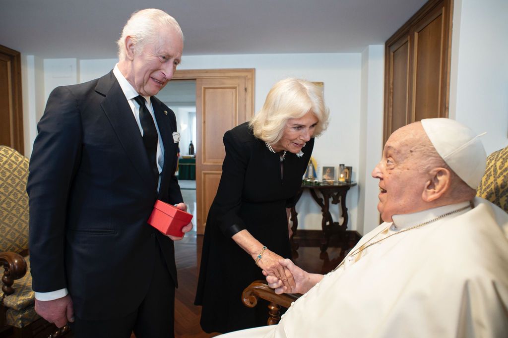 In this handout image supplied by the Vatican on April 10, King Charles III and Queen Camilla meet Pope Francis during day three of their State visit to The Republic of Italy