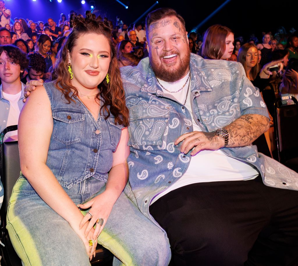 jelly roll sitting next to daughter bailee ann both smiling