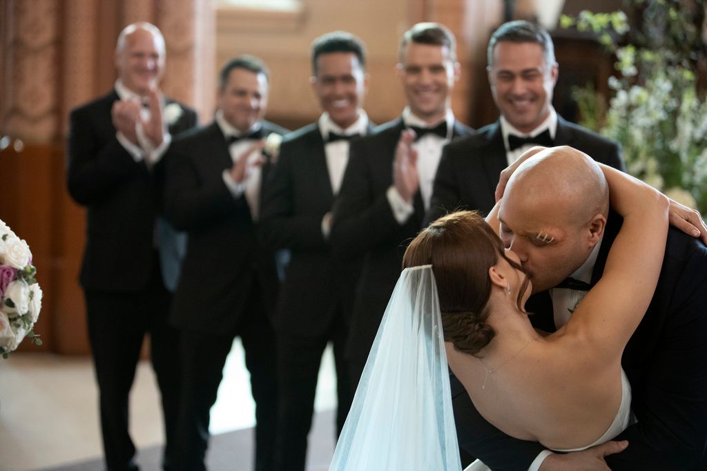 Chicago Fire star Joe Minoso's bride's plunging wedding dress for vampy  nuptials | HELLO!