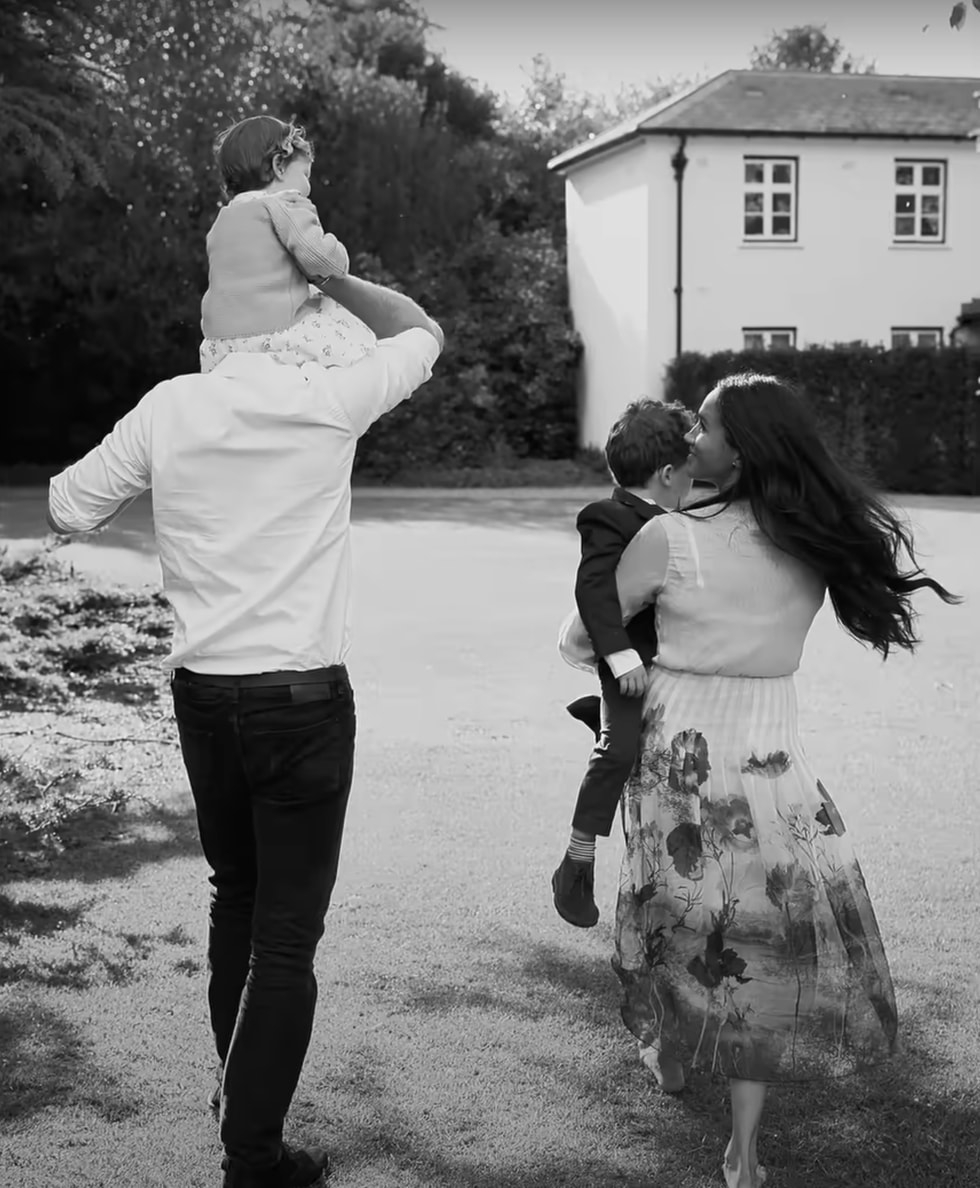 Prince Harry carries Lilibet