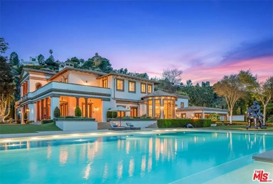 Exterior shot of big house and pool previously owned by Sylvester Stallone now owned by Adele