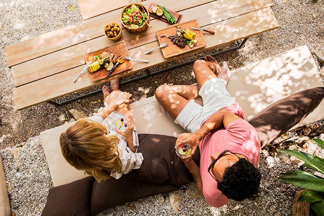 Couple eating at Hillside Beach Club Serenity Beach Bar