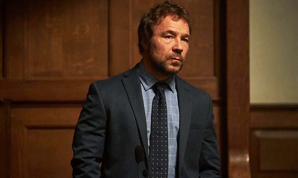 Man in suit in courtroom
