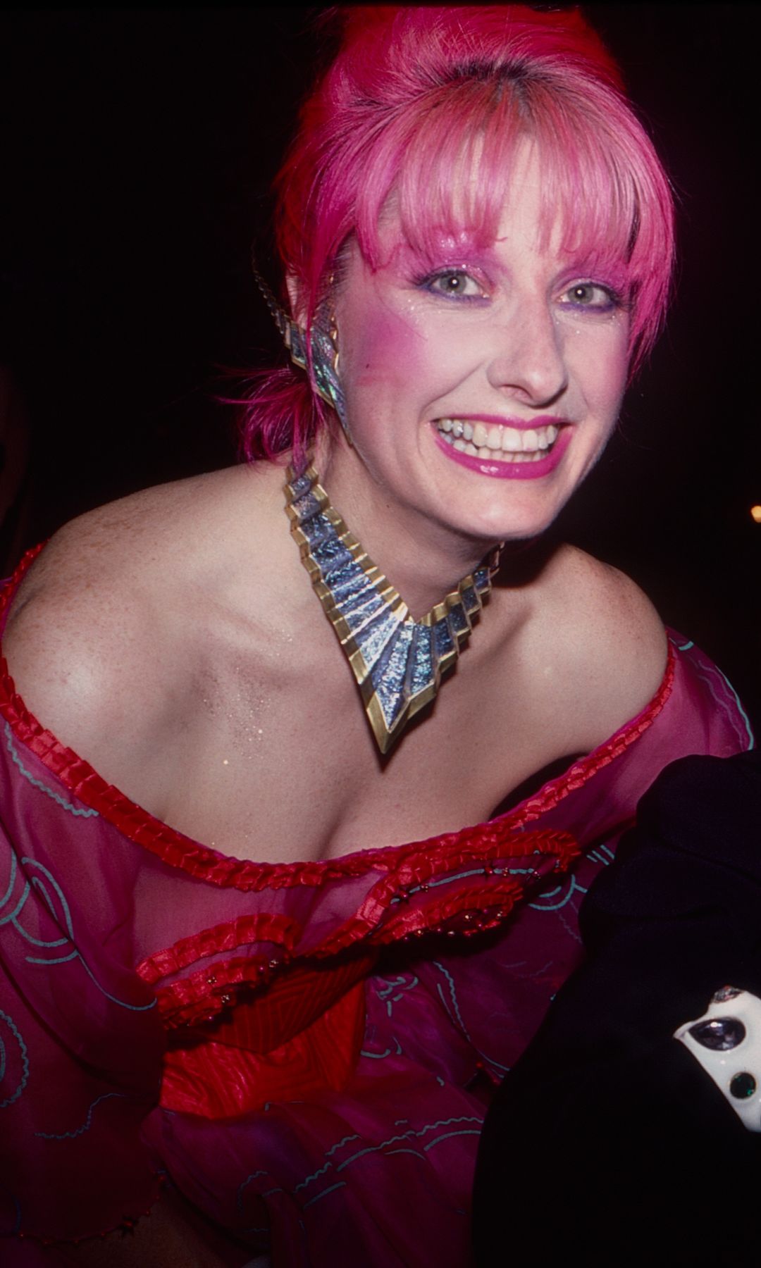Zandra Rhodes in pink hair and metallic geometric necklace at the Met Gala