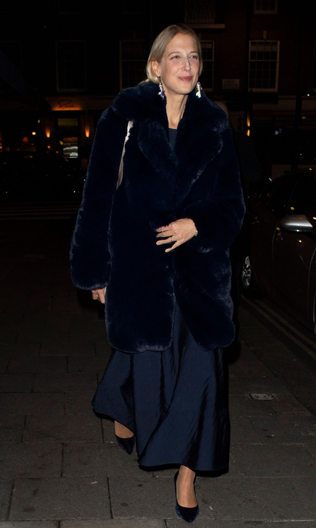 Lady Gabriella Windsor walking in a satin coat