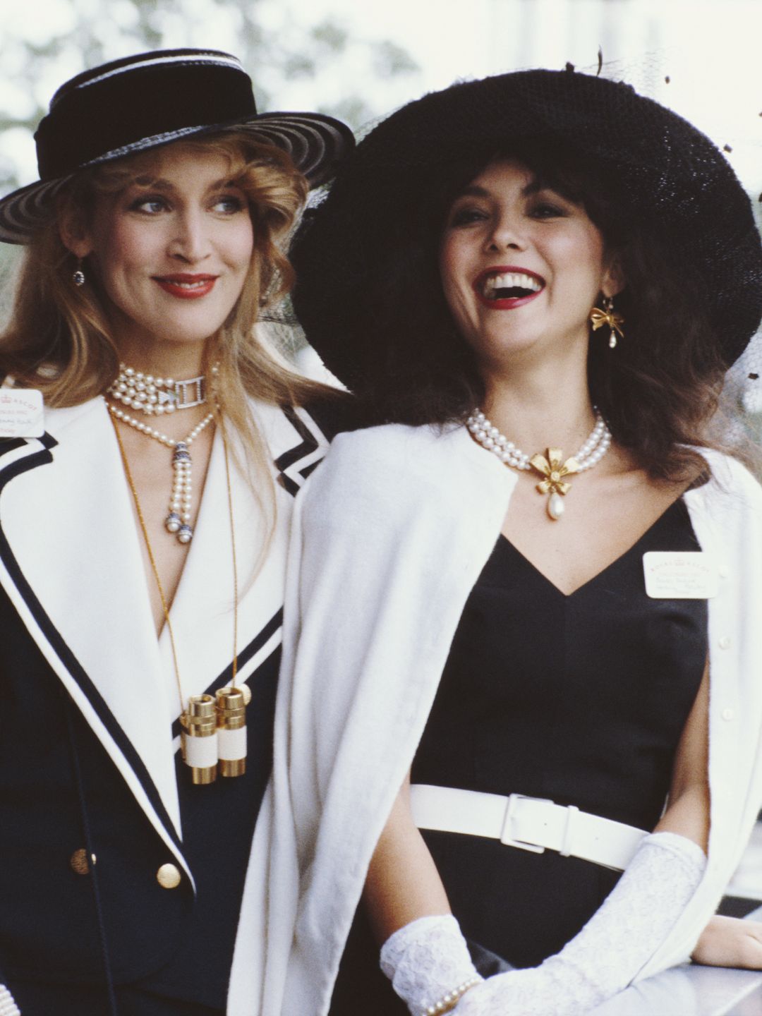 Jerry Hall alongside model Marie Helvin at Ascot in 1982 