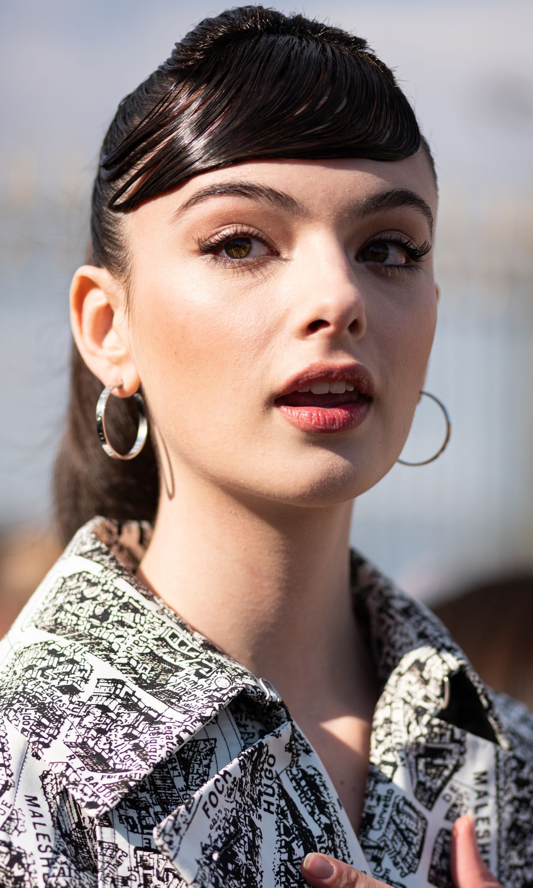 Wet look bangs