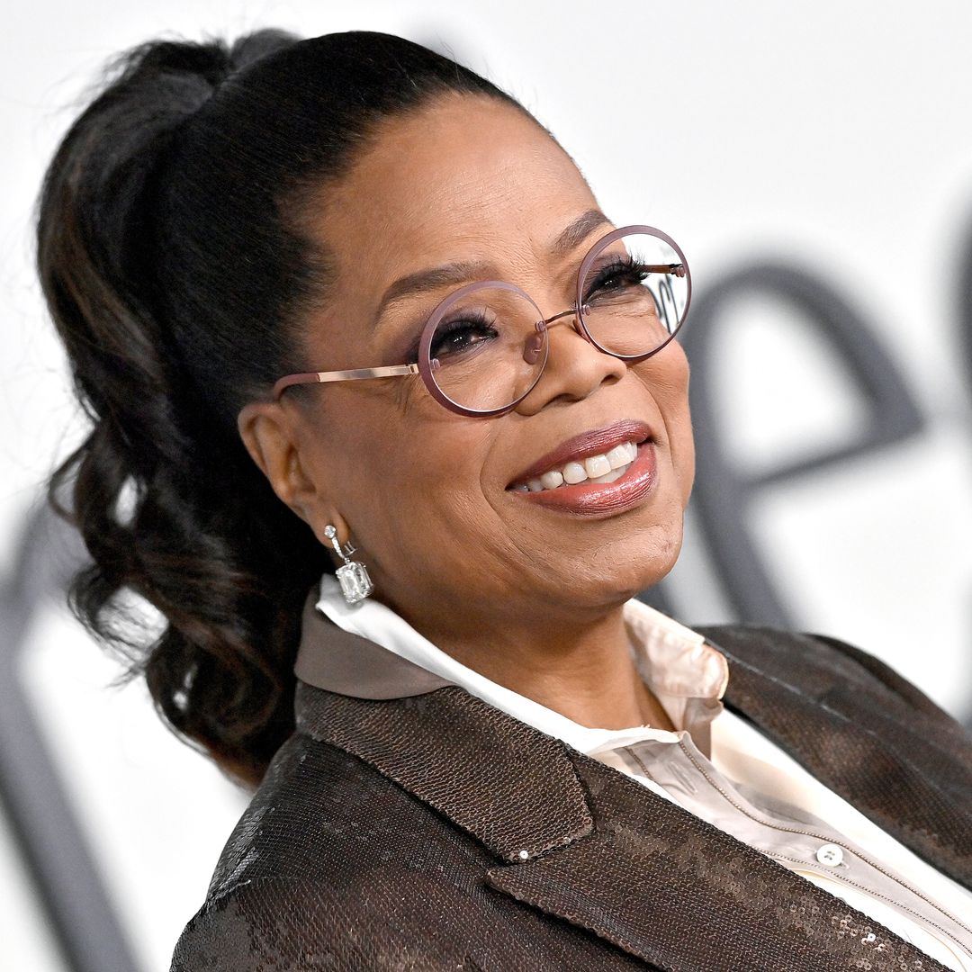 Oprah Winfrey, 70, makes a statement in glimmering suit and galactic flats