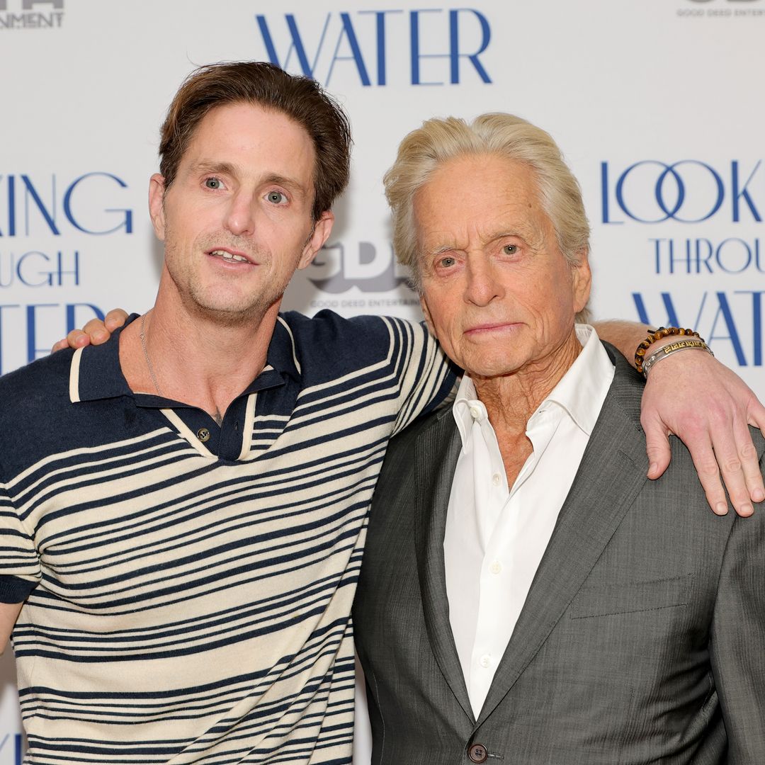 Michael Douglas' son Cameron lifts shirt to reveal tattooed faces of dad and famous grandfather Kirk — watch