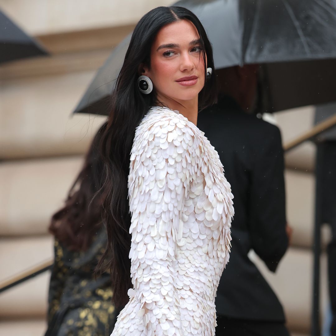 Dua Lipa’s latest look is hanging on by a thread - literally