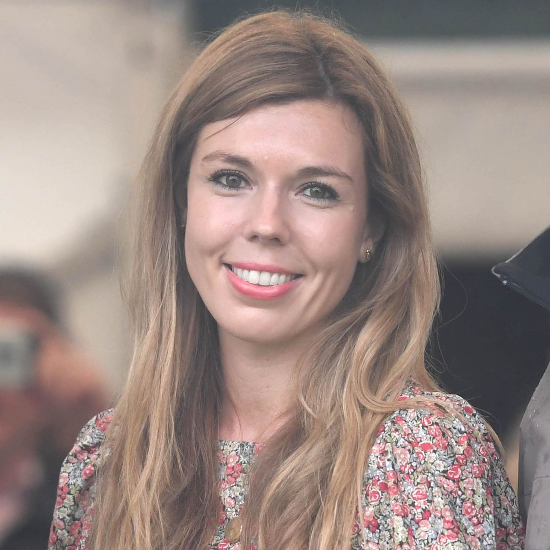 Carrie Johnson's wild-haired children steal the show during family day out