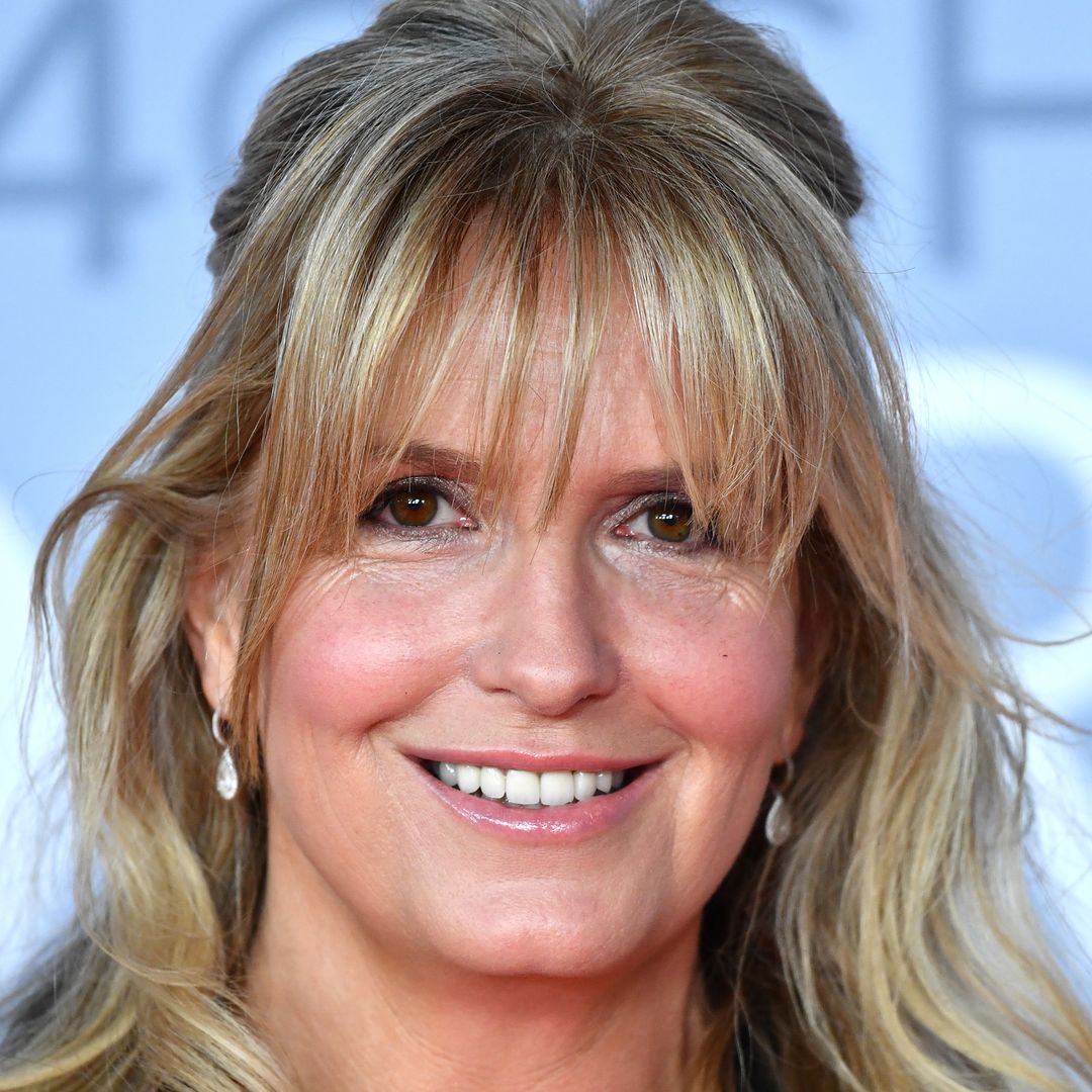 Penny Lancaster's legs have never looked longer in bombshell swimsuit