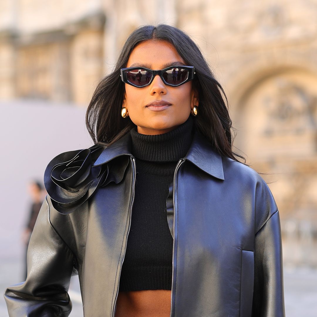 Simone Ashley's thigh high white boots and black micro mini combo has to be seen to be believed