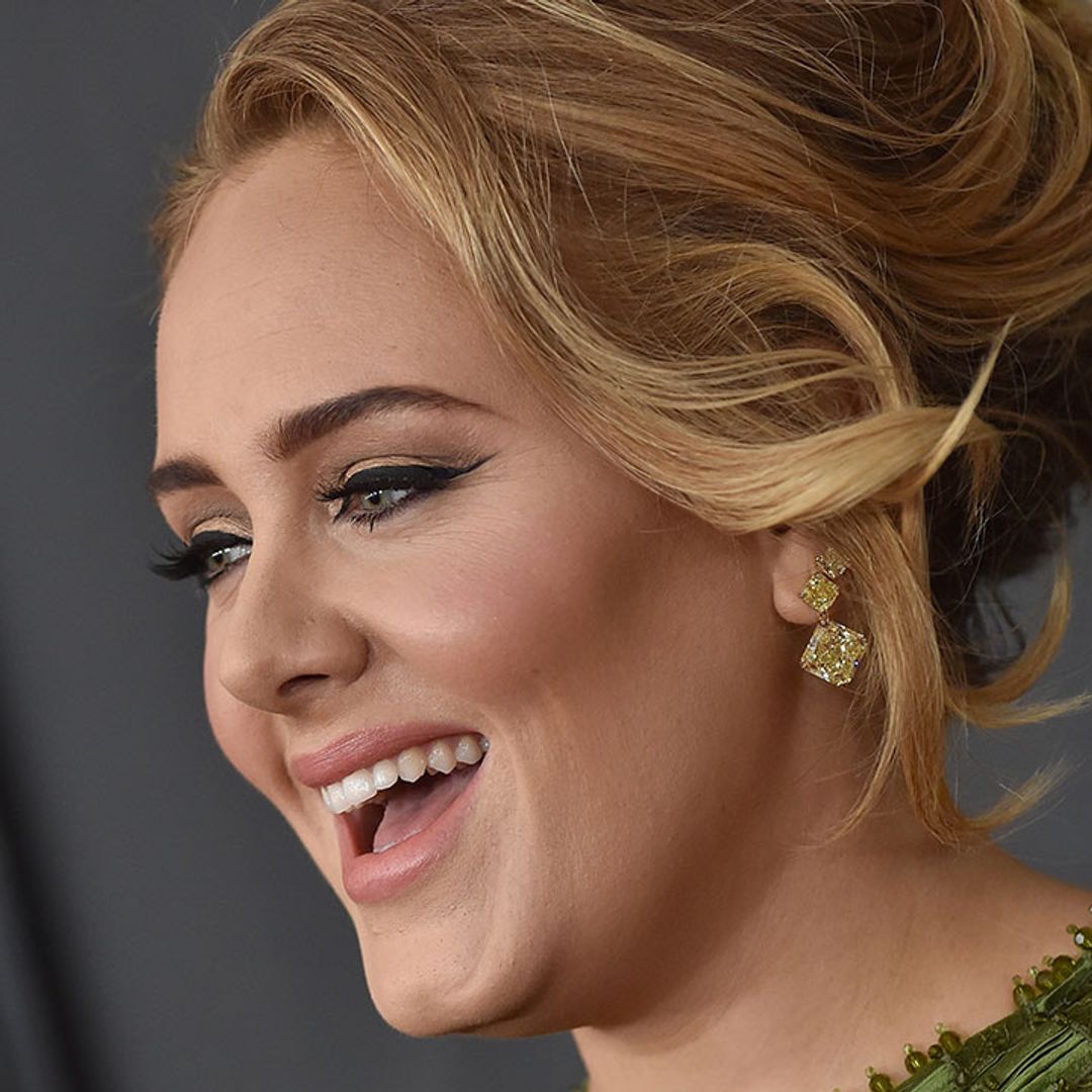Adele looks glowing in striking zebra print dress
