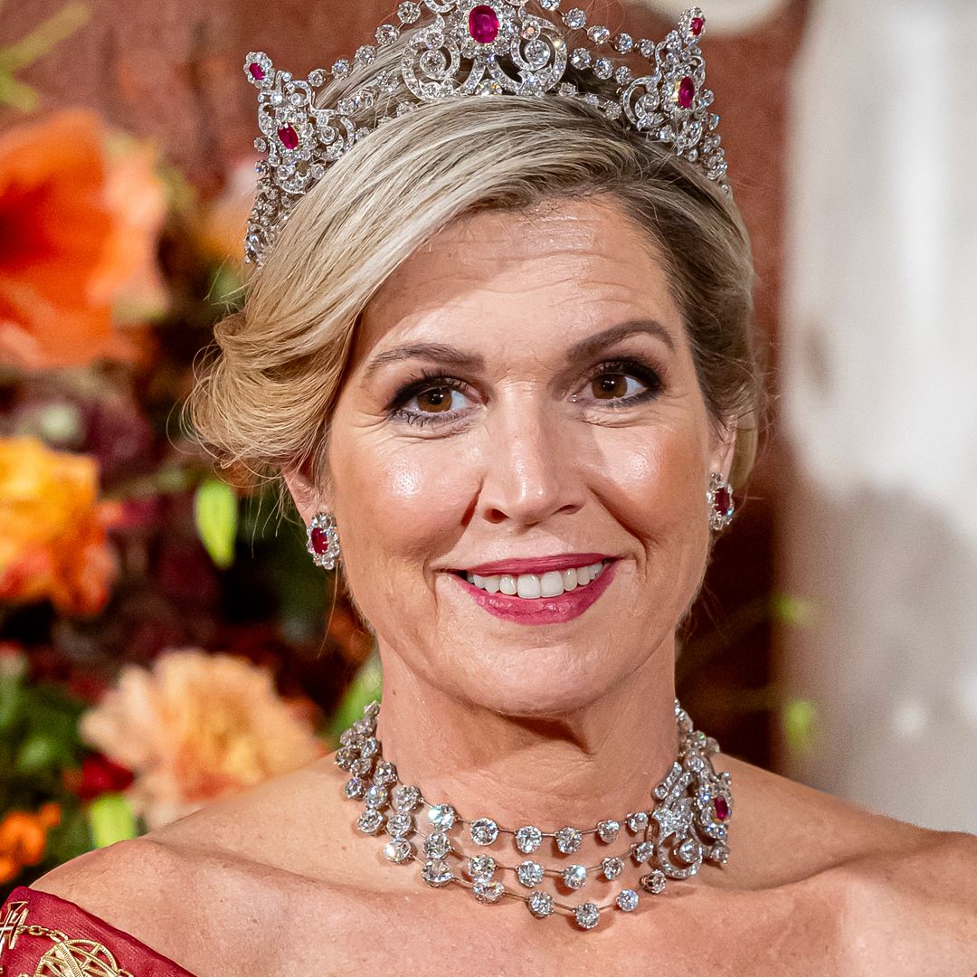 Queen Máxima is resplendent in ruby tiara and unusual gown 