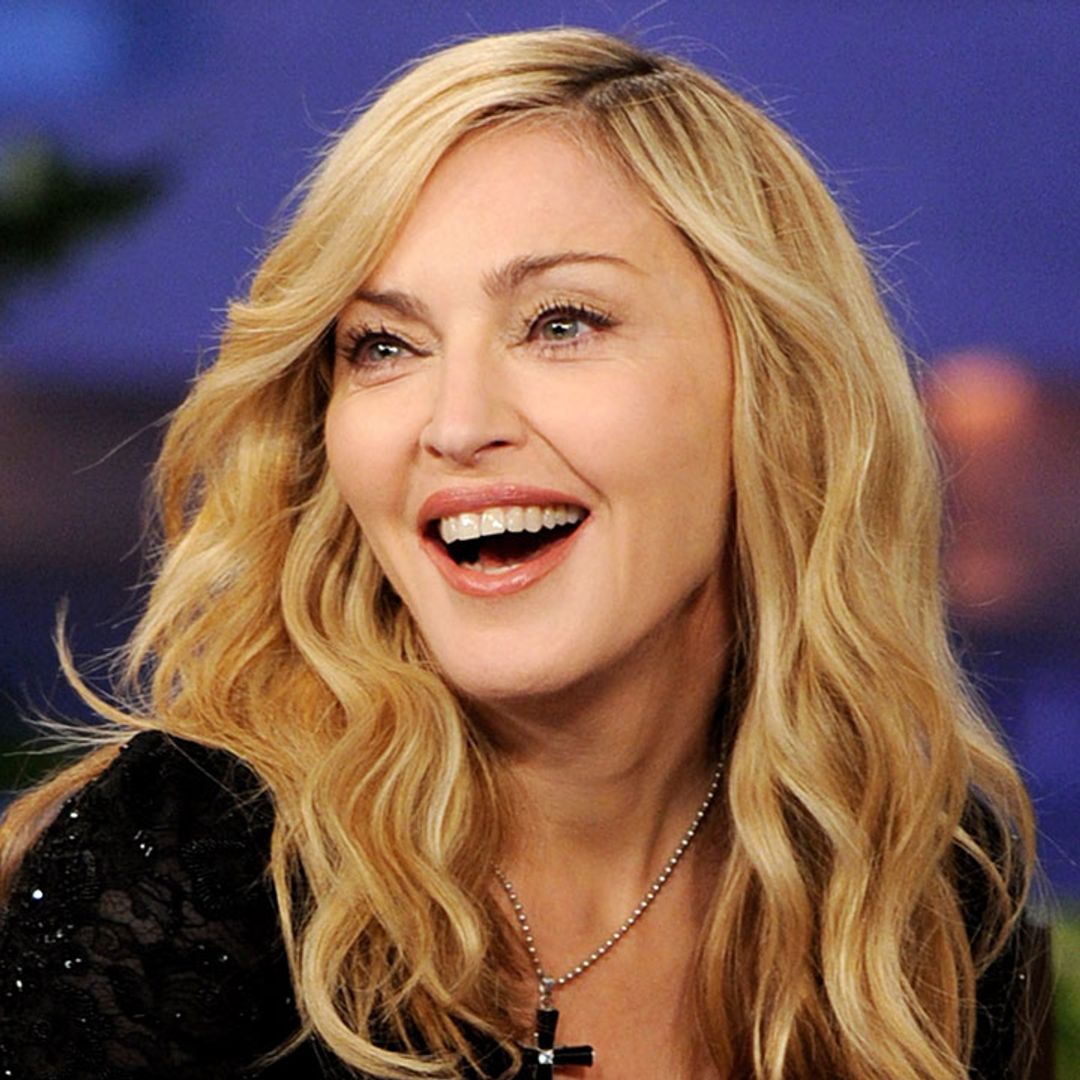 Madonna wows in nothing but fishnets and stilettos in revealing photos