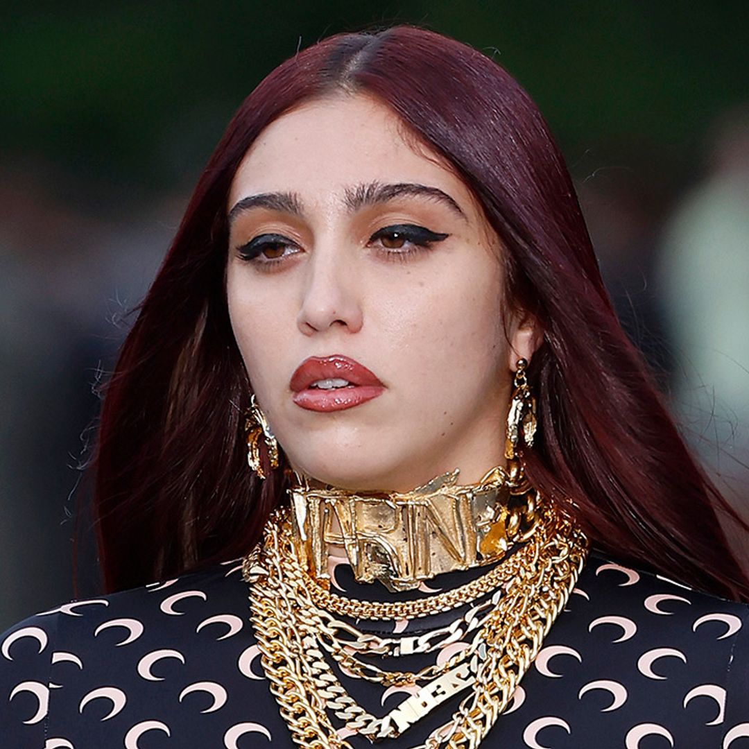 Lourdes Leon rocks edgy denim dress and lacy heeled boots