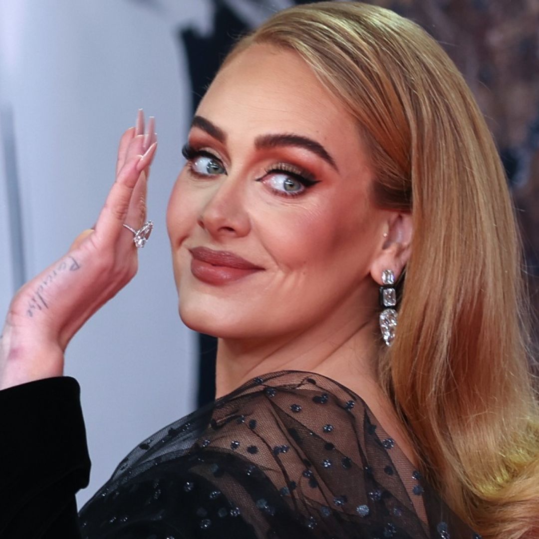 Adele thanks ex-husband in emotional speech as she wear large diamond on ring finger  