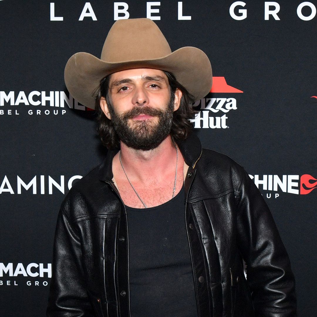 Country star Thomas Rhett leaves show in wheelchair after 'painful' fall – Watch