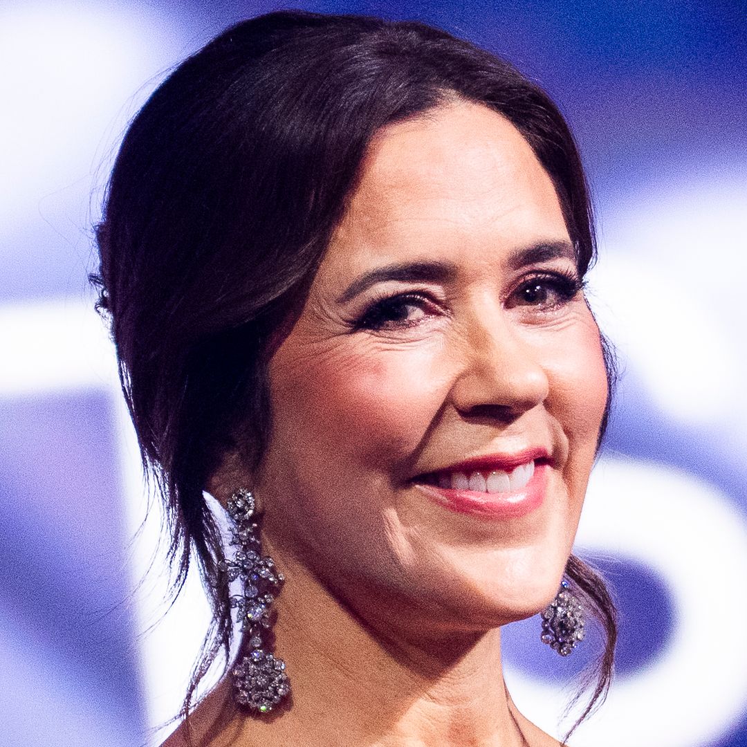 Queen Mary is a fashion spectacle in cut-out pencil skirt – and glitter heels