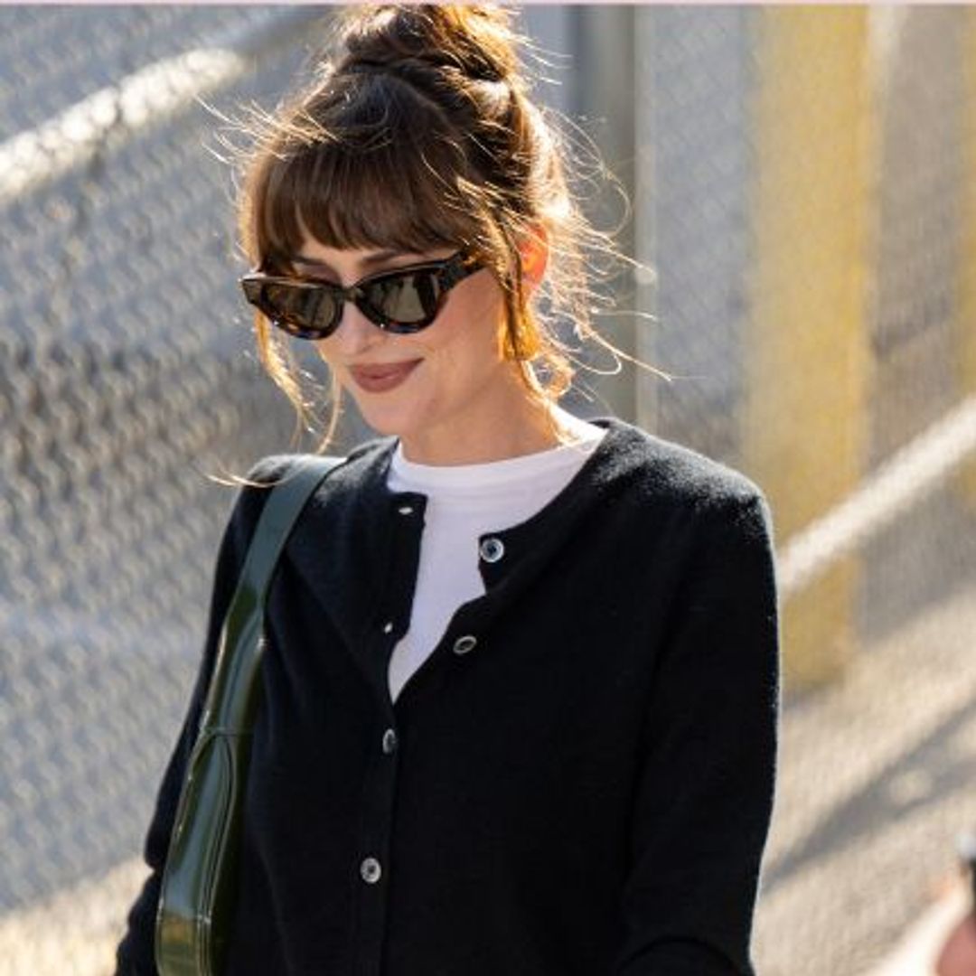 Dakota Johnson proudly watches Chris Martin perform at Glastonbury alongside kids Apple and Moses