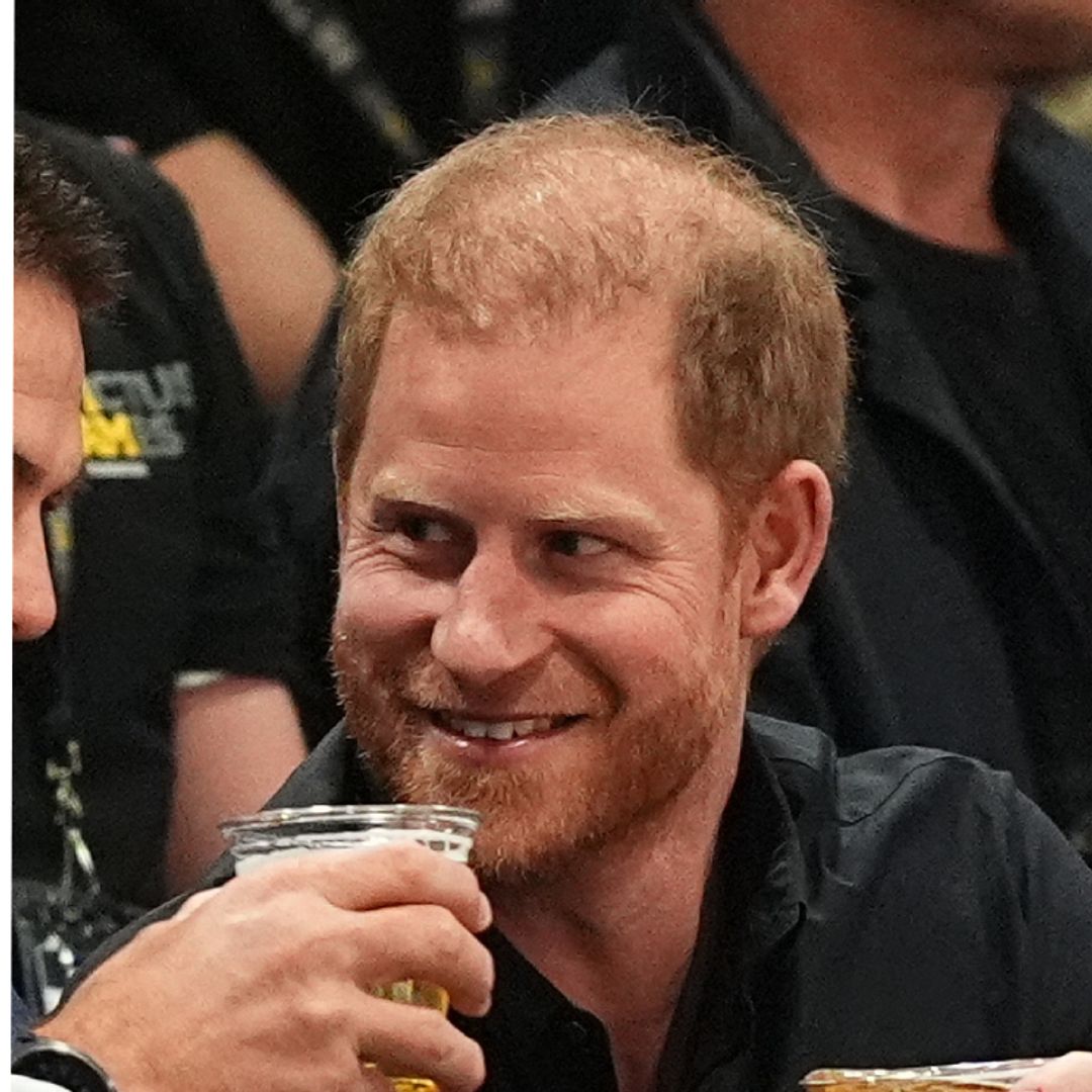 Solo Prince Harry drinks beers, gives celebratory kisses to Team UK at Invictus Games