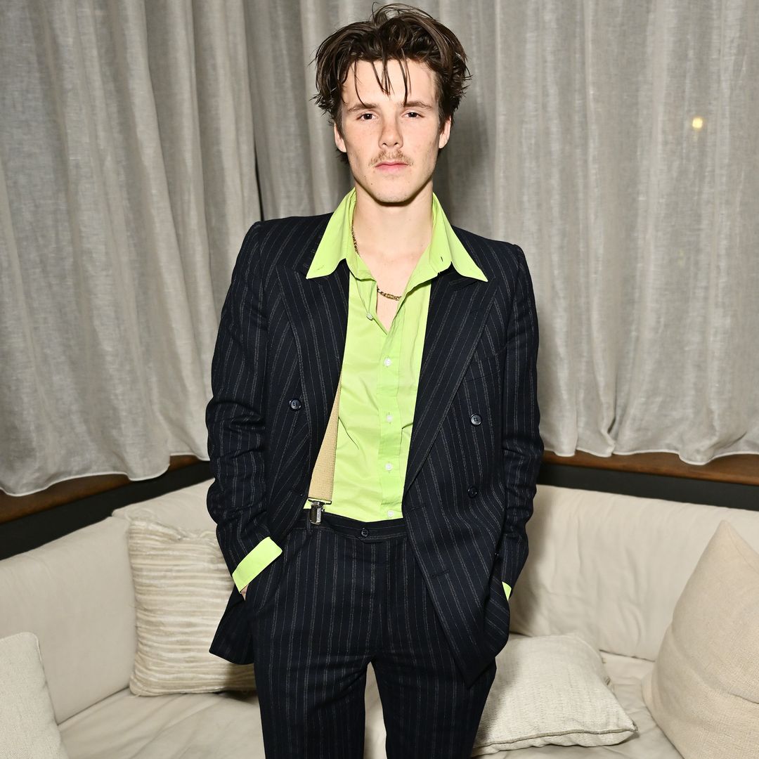 Cruz Beckham looks almost unrecognisable with 70s-style shag 'do