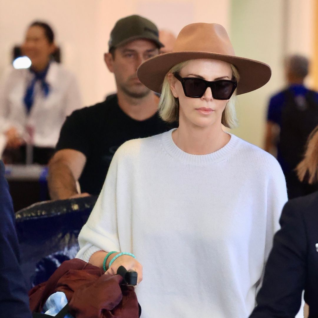 Charlize Theron stuns in low key look as she arrives in Sydney for exciting chapter