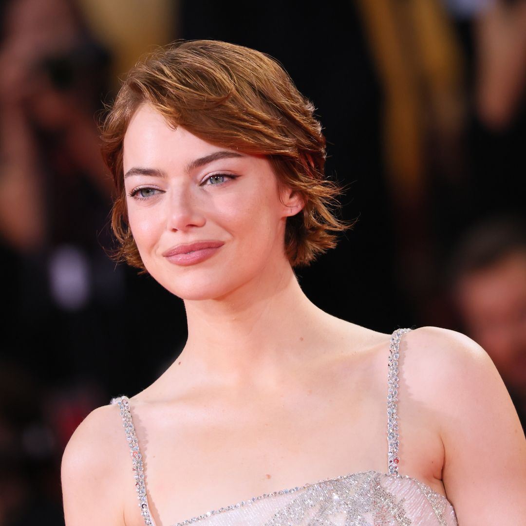 Emma Stone debuts 'spiced sienna' hair transformation after shaving her head for bold new role