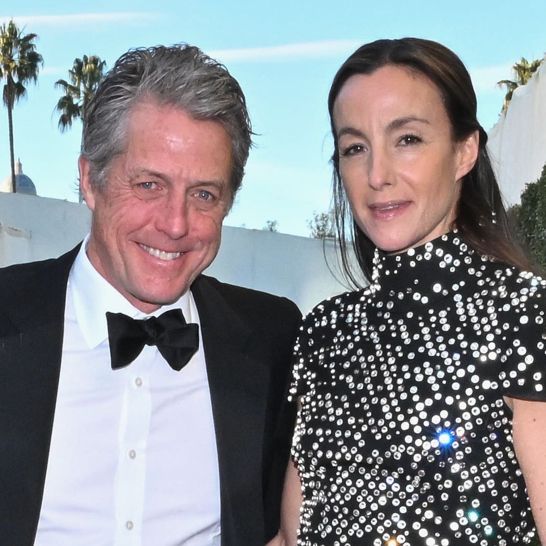 Hugh Grant, 64, puts on a brave face with wife Anna Eberstein, 46, after huge snub