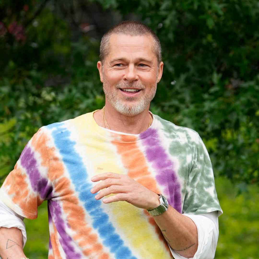 Brad Pitt looks incredibly fresh faced with long locks in latest photos