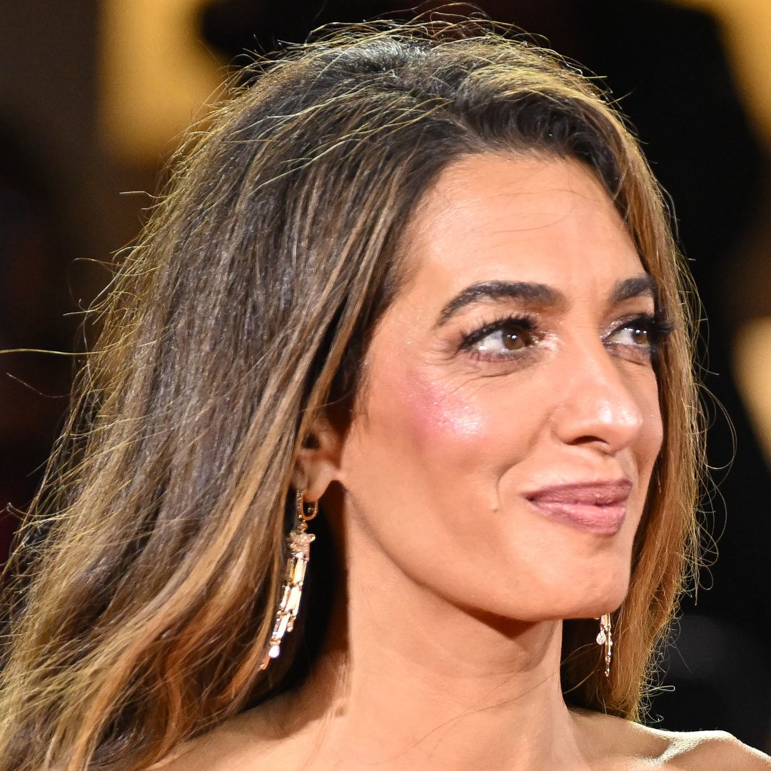Amal Clooney flies under the radar in 'refined' trench