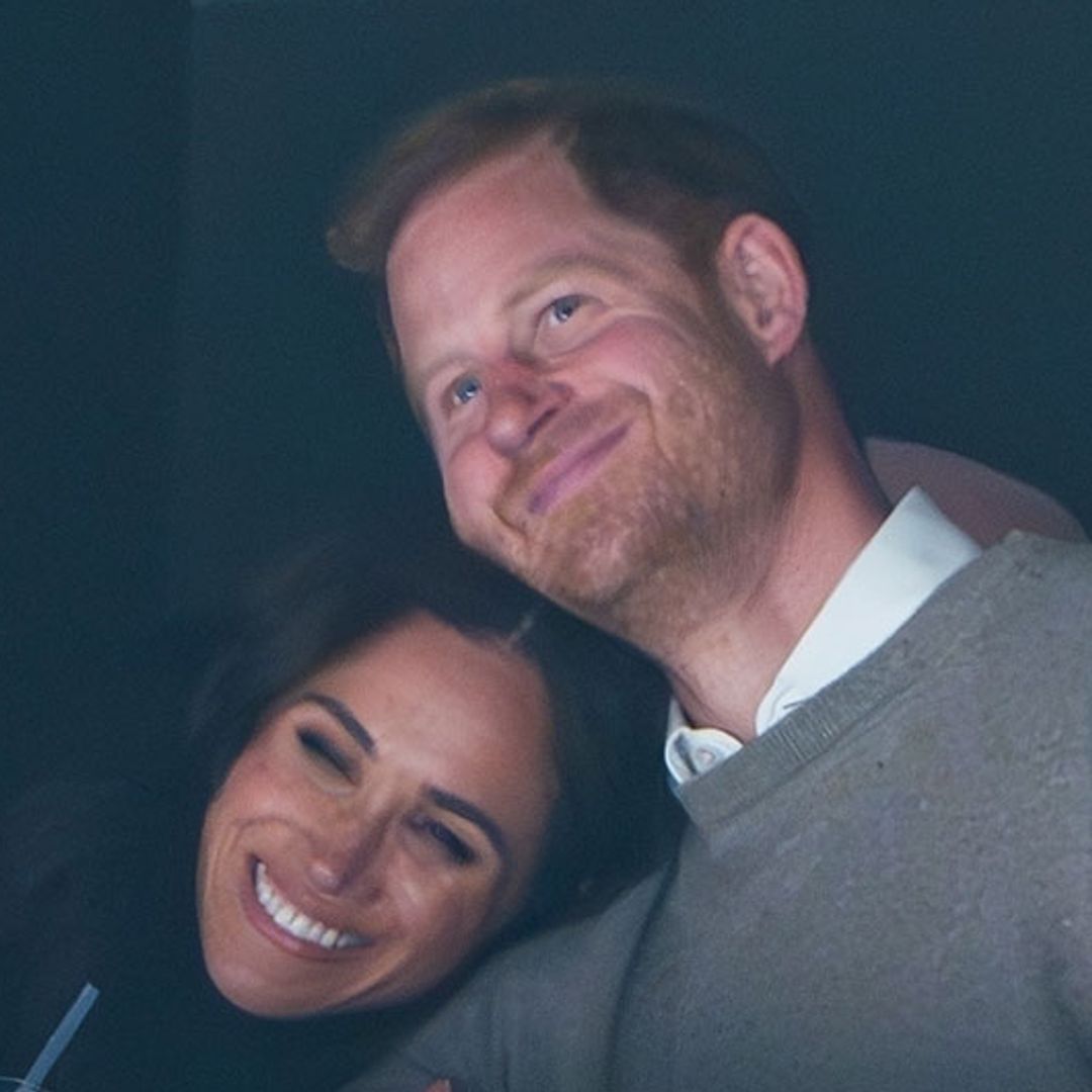 Prince Harry and Meghan Markle pack on the PDA during intimate tour moment
