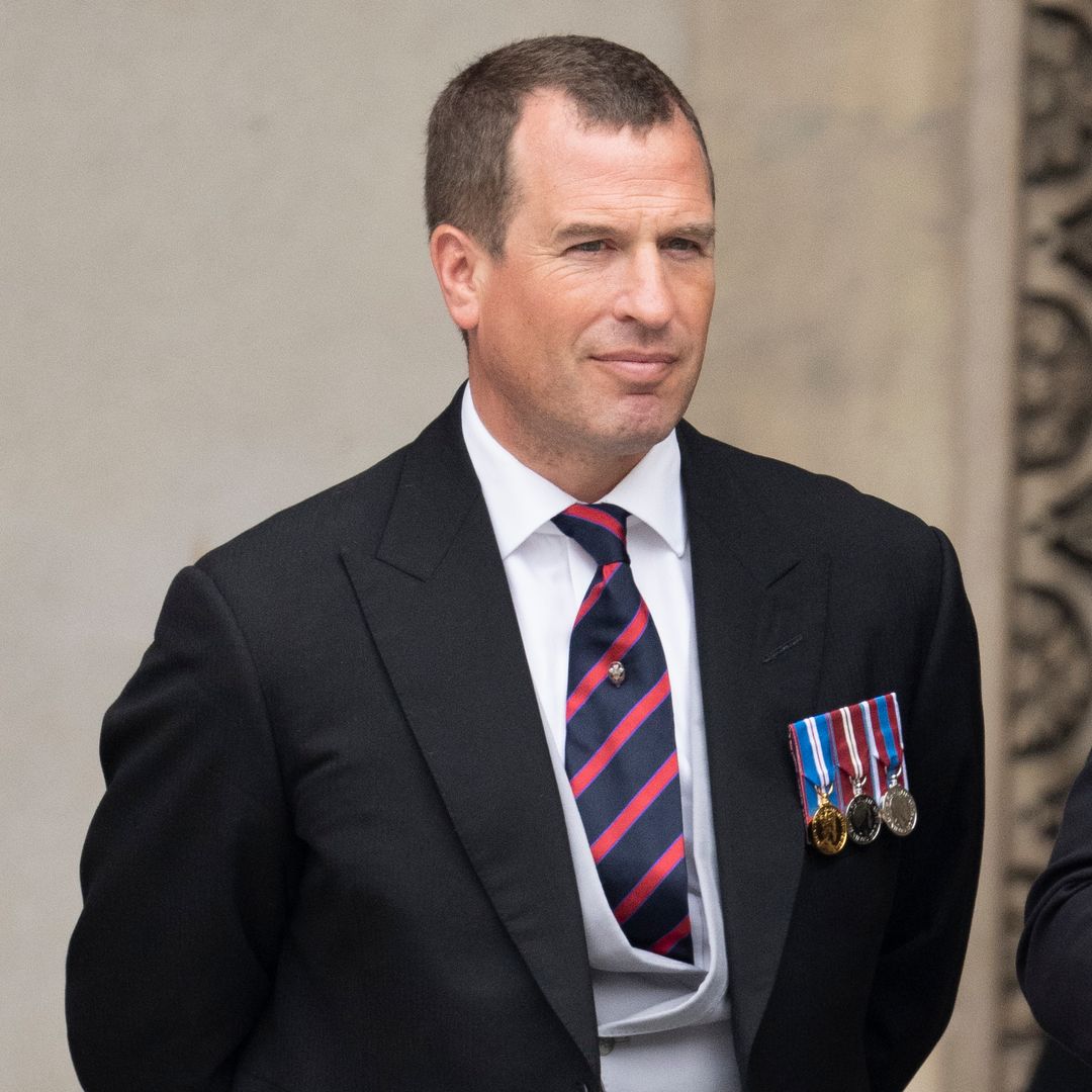 King Charles pictured embracing nephew Peter Phillips in rare photo