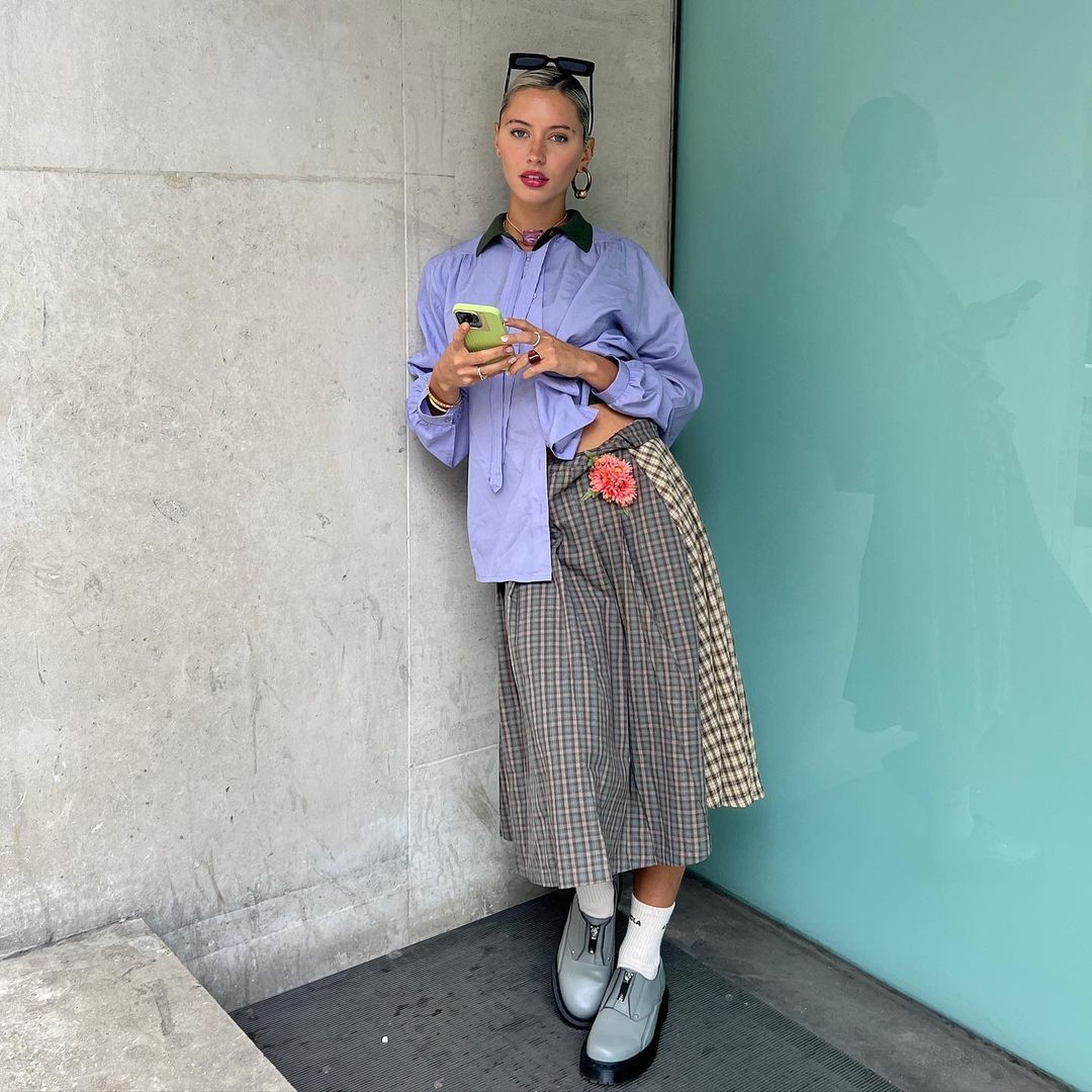 Iris Law shows off new birthday neck tattoo on TikTok