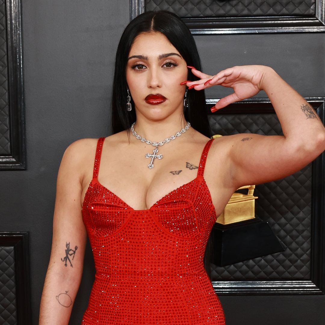 Madonna's daughter Lourdes Leon rocks out in a revealing cut up graphic tee and low-rise jeans in latest appearance