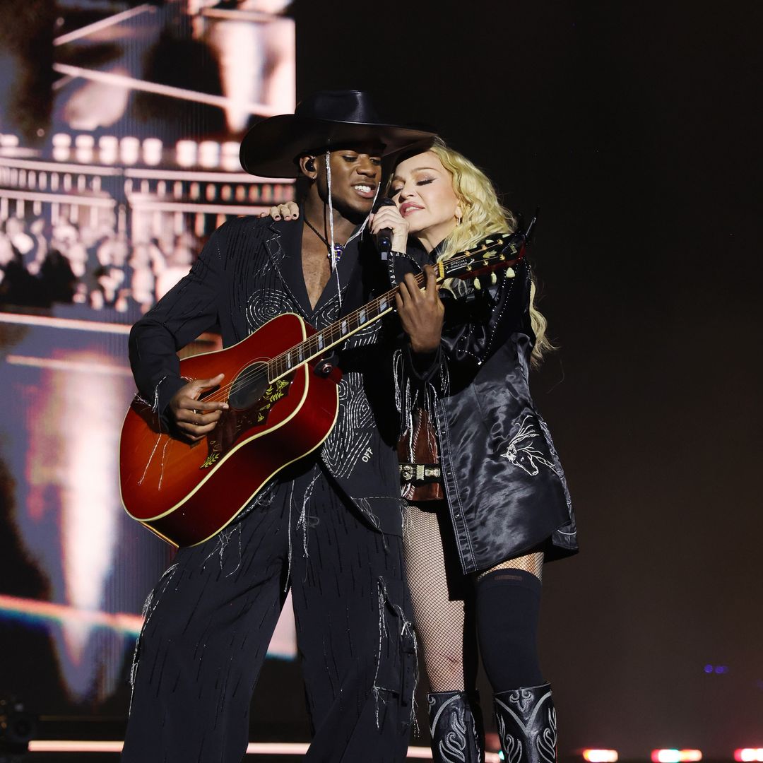 Madonna, 65, has son David Banda, 18, close at hand as she steps out in Paris after near brush with death
