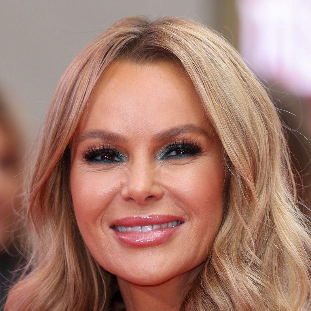 Amanda Holden is a bronzed goddess in daring cut-out mini dress