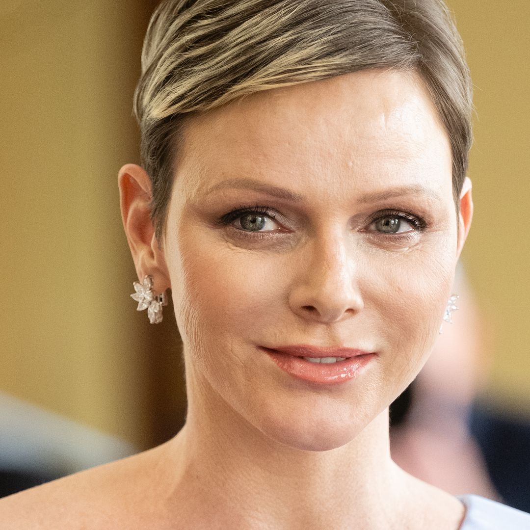 Princess Charlene was a total glitterbomb in Y2K satin corset and bridal skirt 
