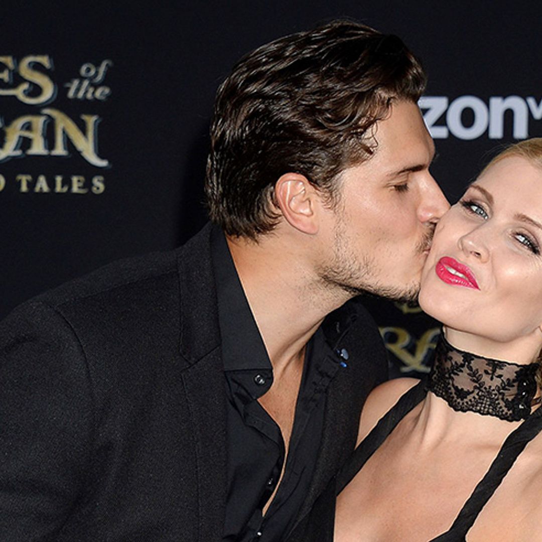 Strictly's Gleb Savchenko plants a loving kiss on wife Elena's growing baby bump